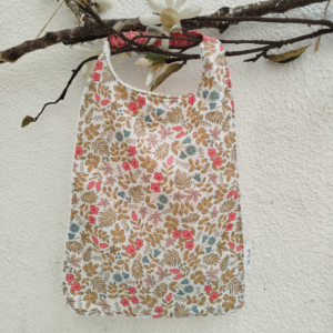 Bavoir en coton motifs floraux